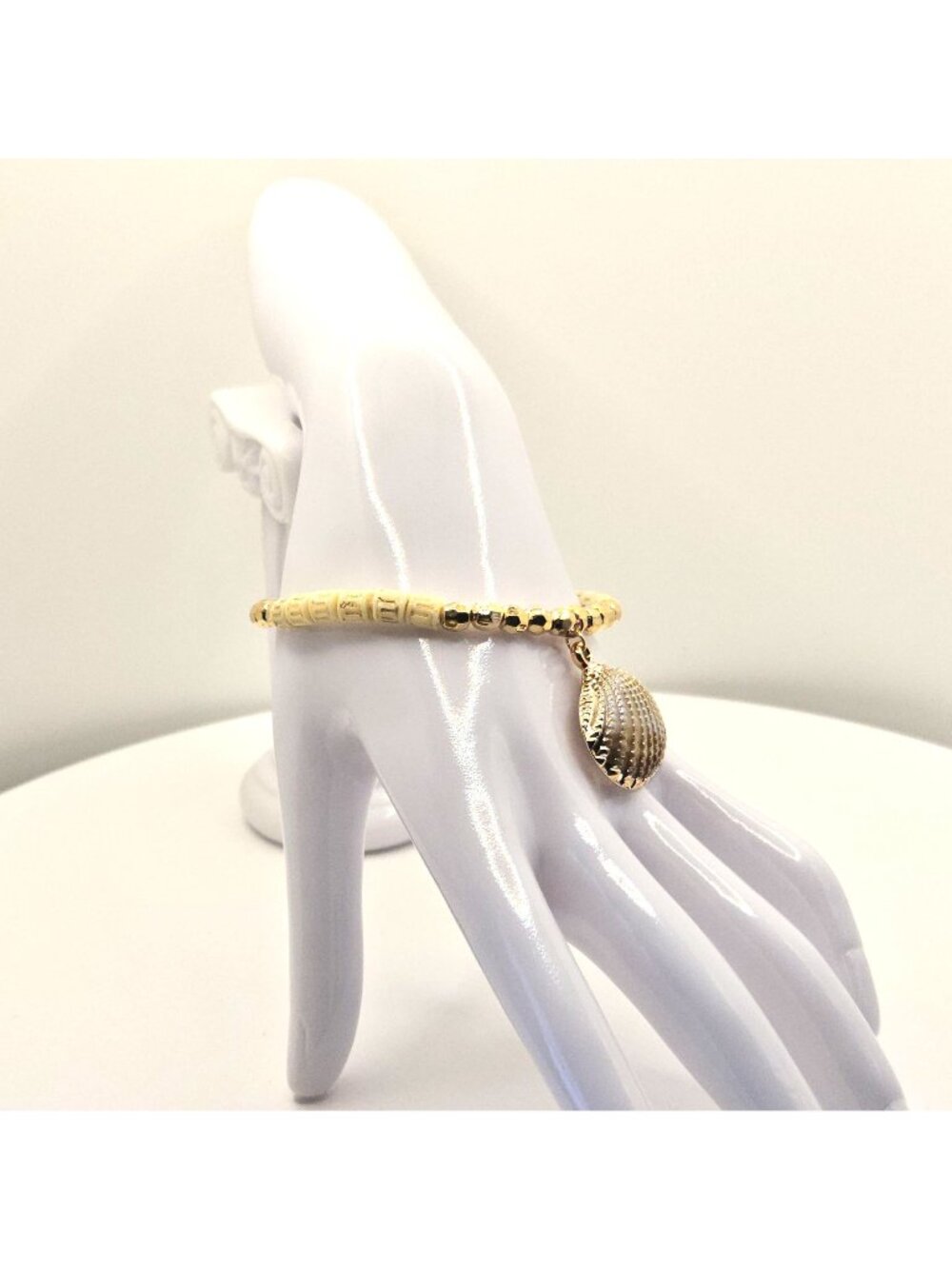 Gold Tone And Ivory Beaded Bracelet With Faux Shell Charm - Coastal-Inspired Jew